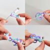 a4dba51dc9e841dc9a5caab406536e31-goods.jpeg 2-Pack Smiley Silicone Cable Protectors